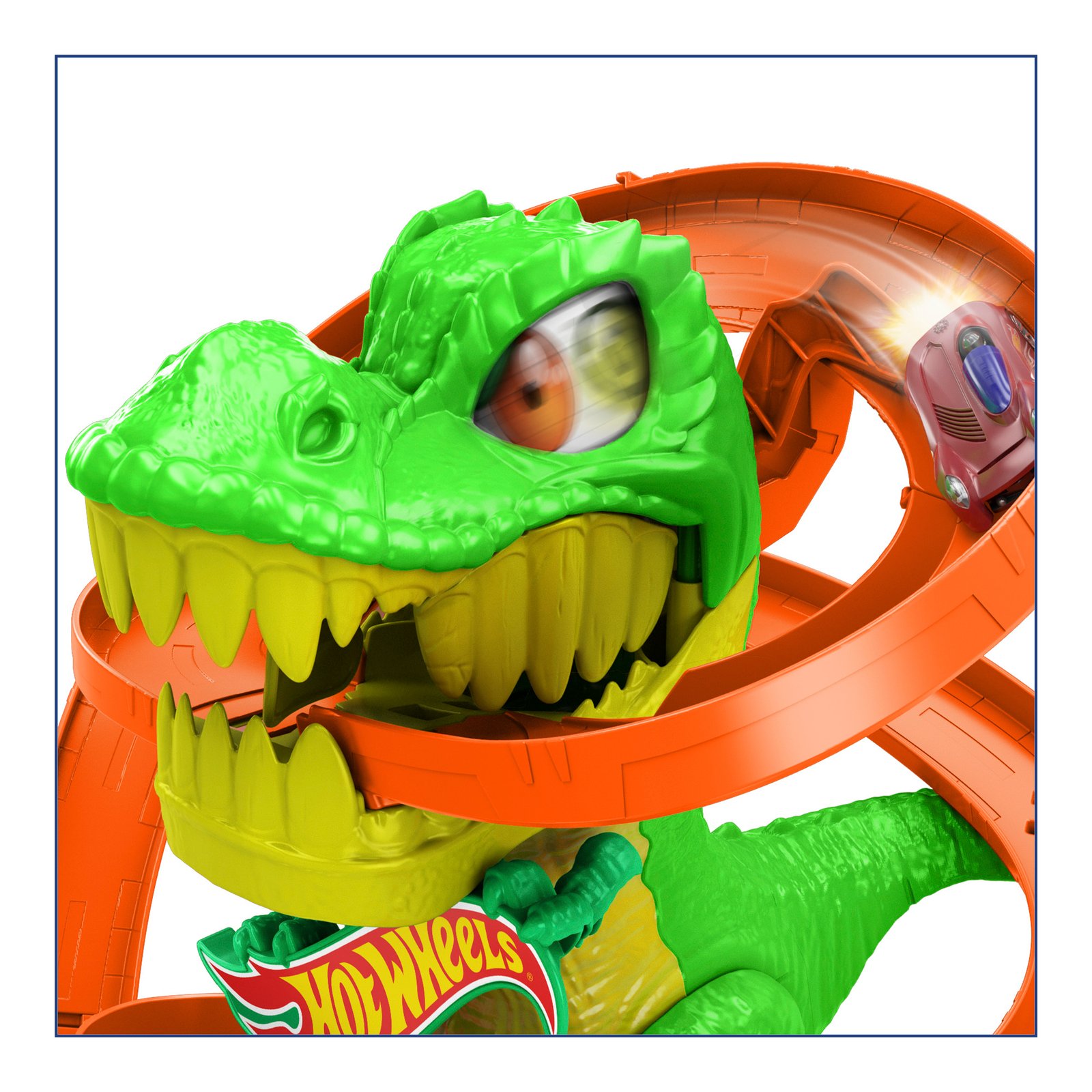 Žalio T-Rex galva iš arti, aplink ją vingiuoja oranžinė trasa