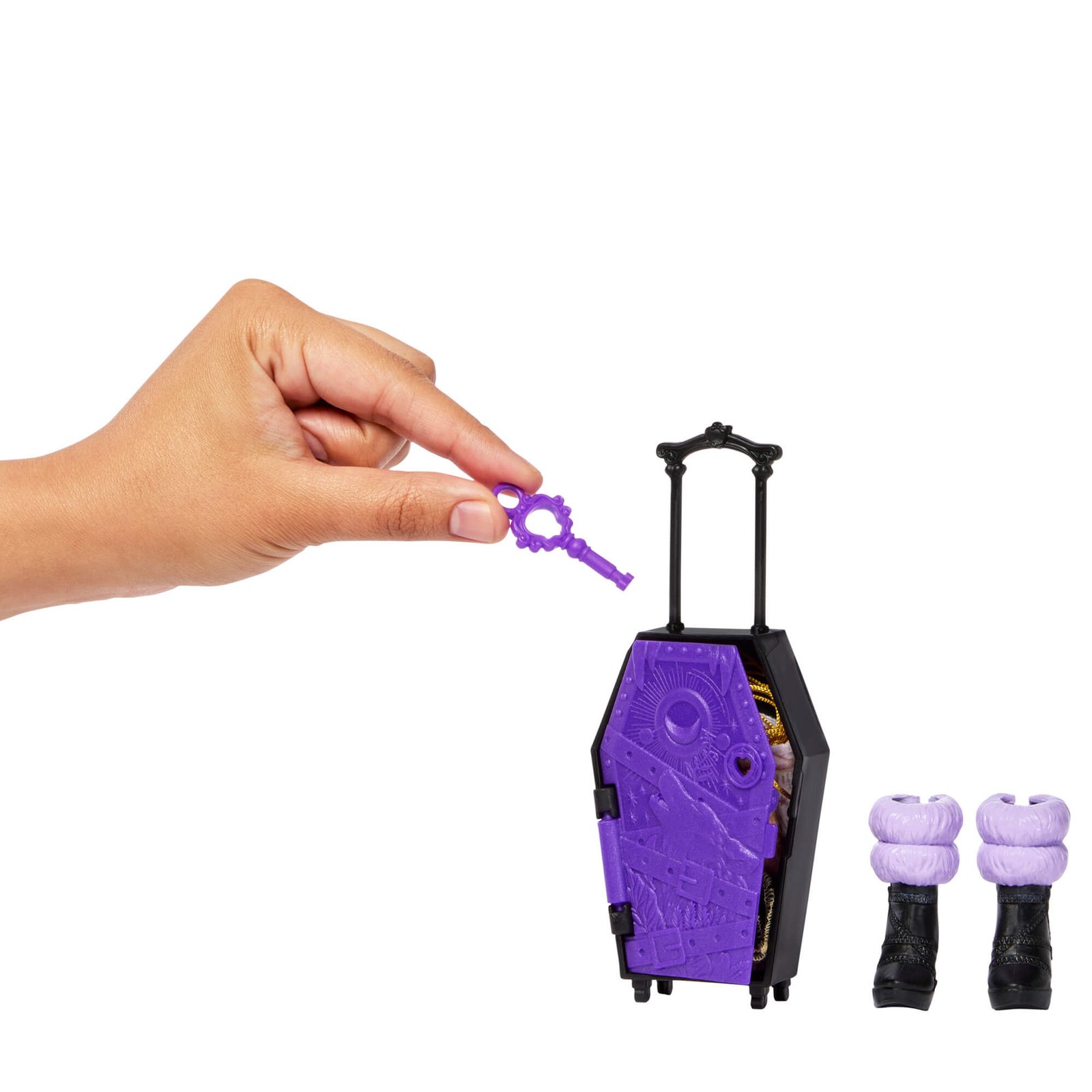 Violetinis raktelis ir karsto formos lagaminėlis ant ratukų