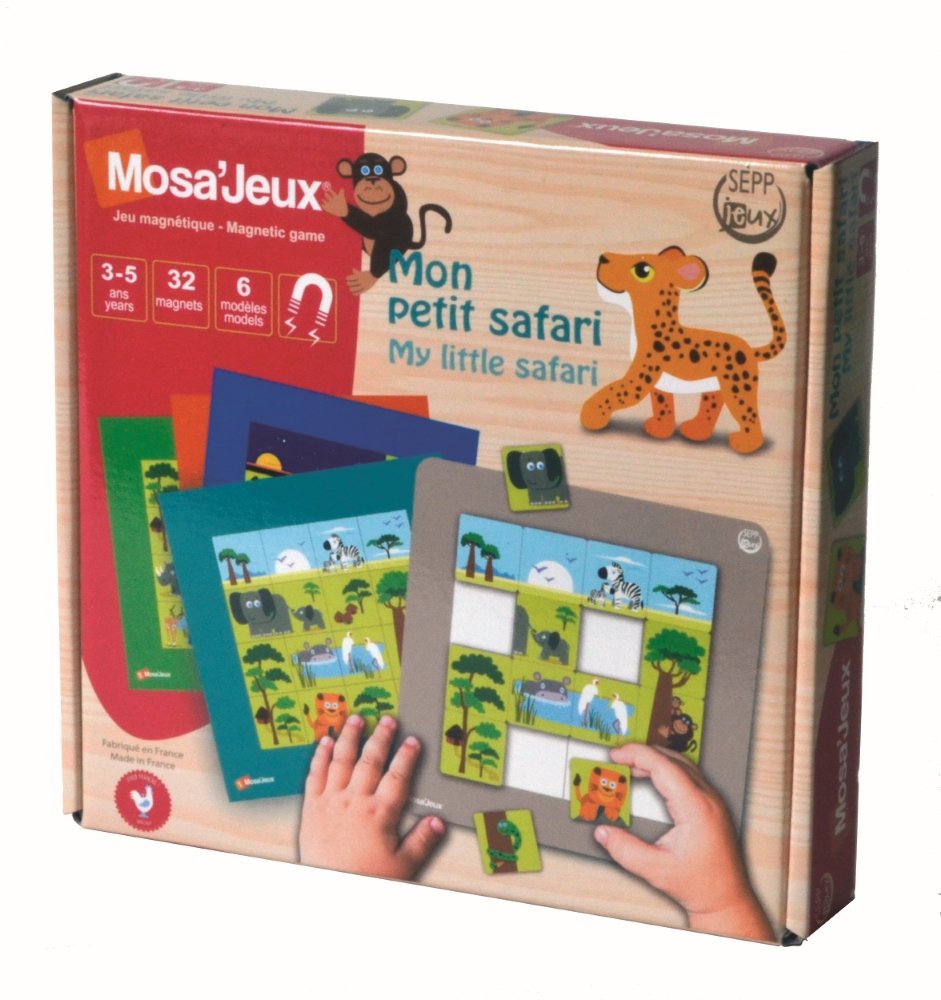 Dėžutė „Mano mažasis safari“ su dėmėta laukine kate ir vaiko ranka, dedančia magnetuką ant lentos
